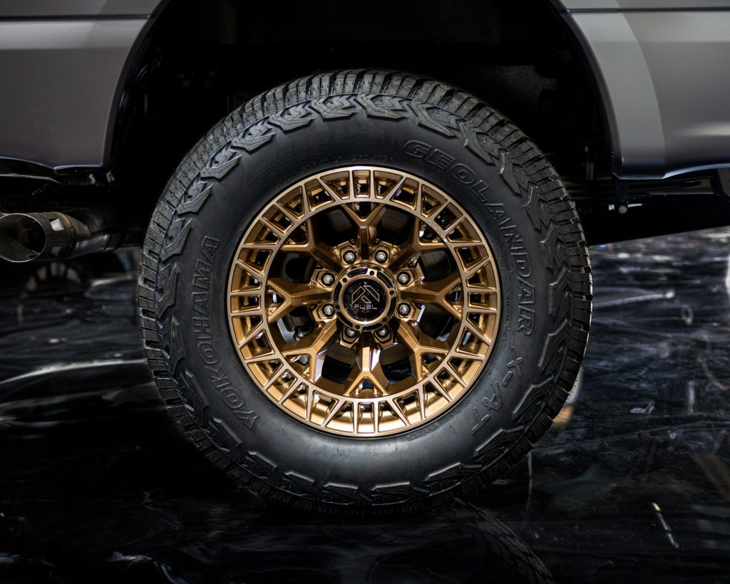 Custom truck wheels and tires on display at the SEMA Show, built by Apex Custom Innovations Dallas-Fort Worth