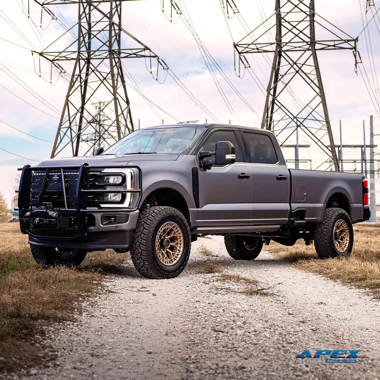 2025 Ford F-350 with ReadyLIFT suspension, Fuel Off-Road wheels, Yokohama tires, XPEL Tarmac PPF, and Ranch Hand brush guard built by Apex Custom Innovations in Dallas Texas